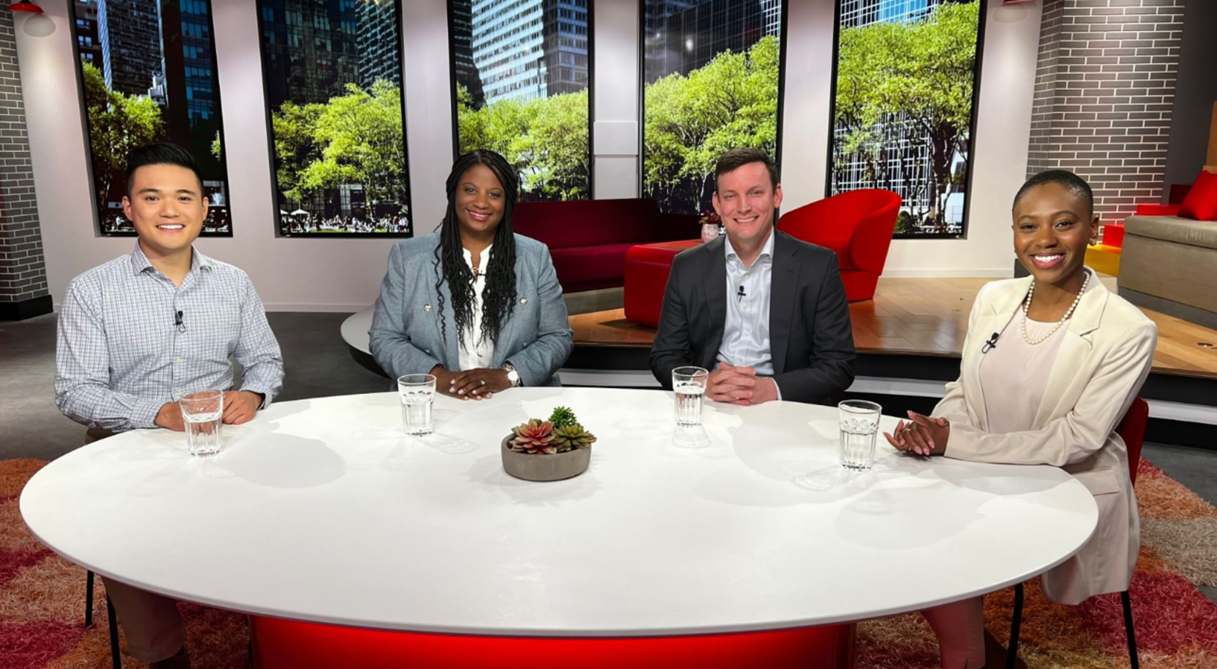 Andrew Pham speaking on a PwC firmwide webcast panel with Yolanda Seals-Coffield, Chief People Officer, and Paul Griggs, PwC Partner, discussing leadership and diversity.